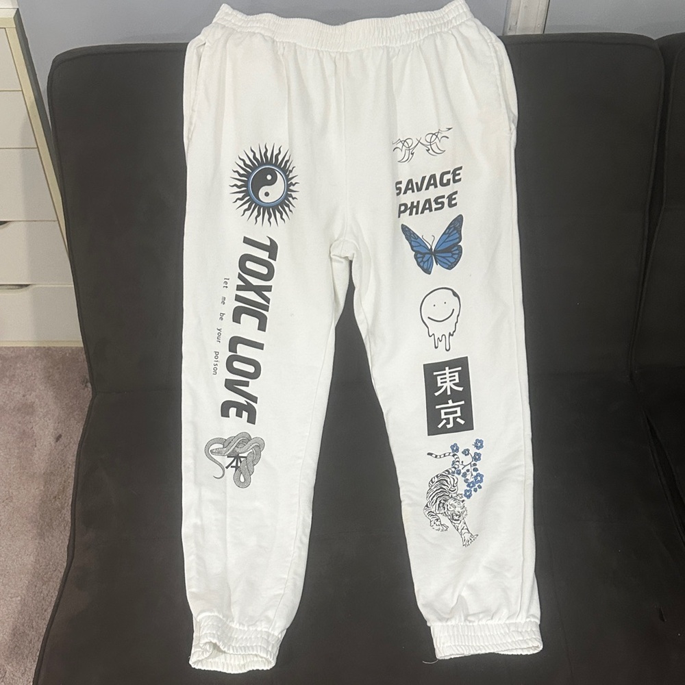 Graphic White Joggers with Black and Blue Prints